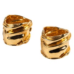 A Pair of Gold Tone Cuffs by Ciner