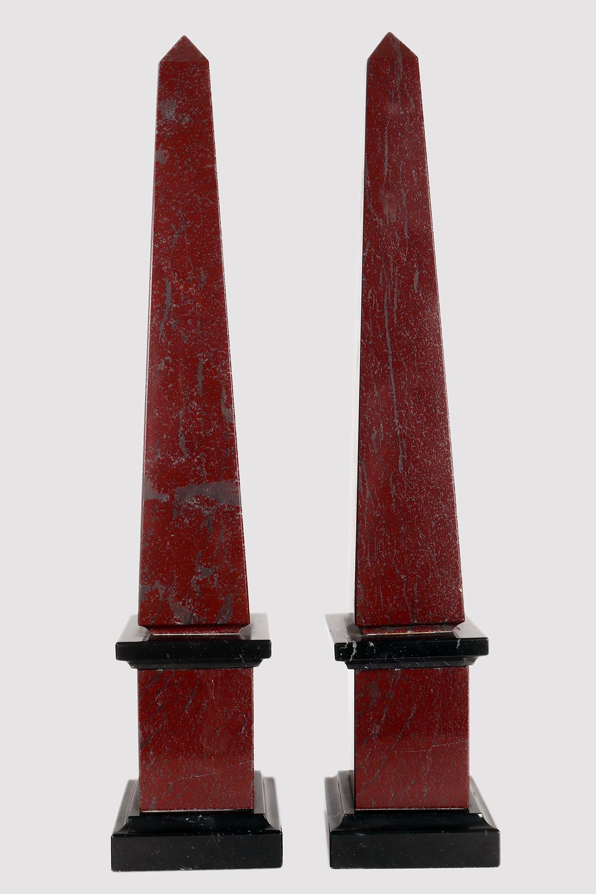 A pair of Grand Tour obelisks. Made of red Levanto marble and black Belgian marble. Italy second half of the 19th century.