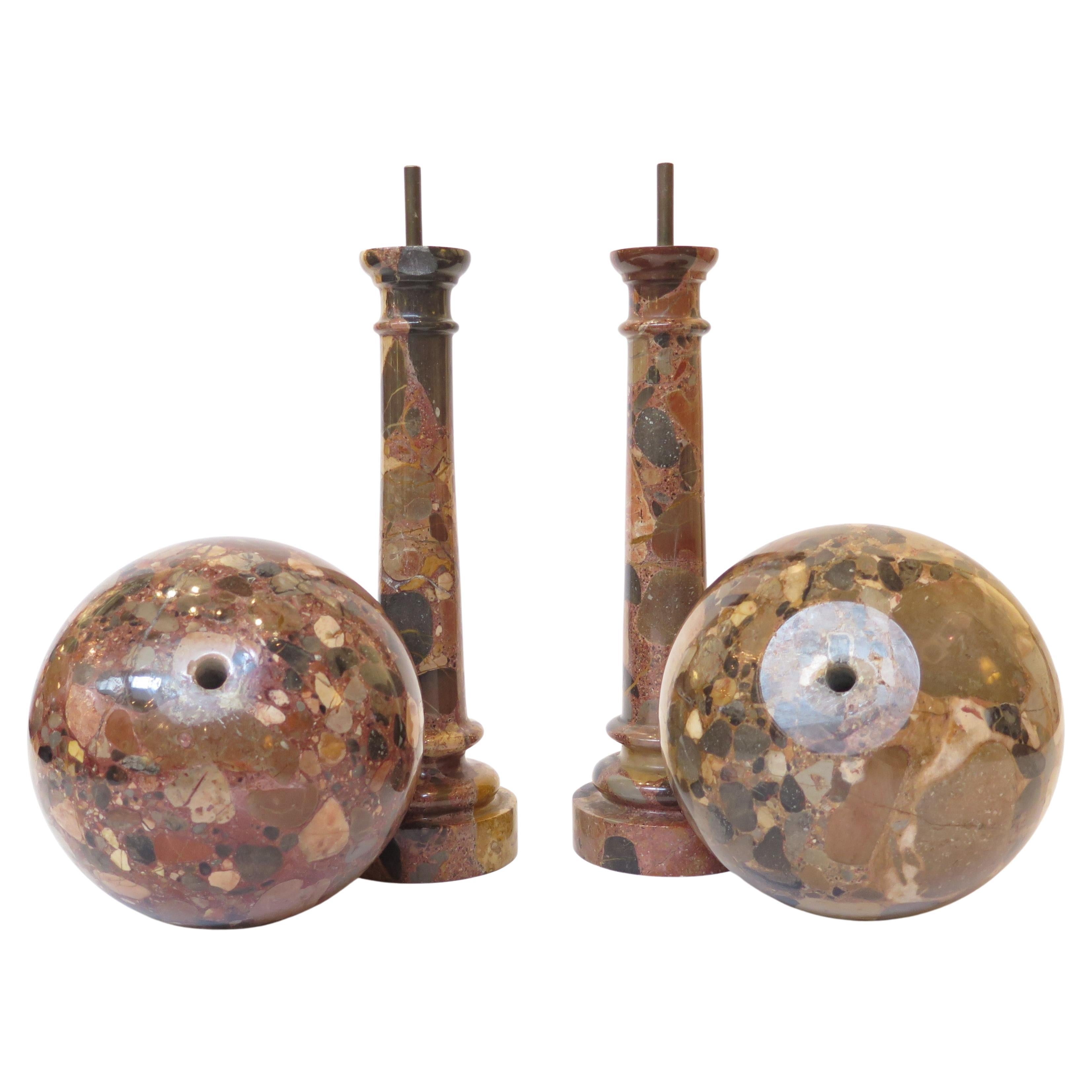 pair of Grand Tour Souvenir specimen marble orbs balanced atop round tapered columns of the same marble. Italy, circa 1860 

NOTE: there is a small chunk missing from the base of one of the columns, SEE IMAGES, circled in black