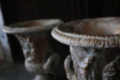 Pair of Grecian Pottery Jardinières Depicting Carved Grecian Men and Women