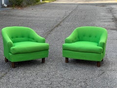 A pair of green mid-Century modern Monroe of selig barrel back chairs