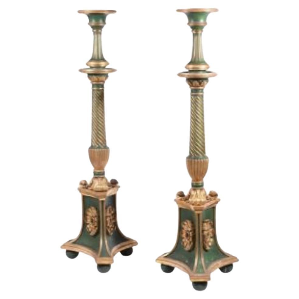 A Pair of Green Painted and Parcel Gilt Torchers, 19th Century For Sale