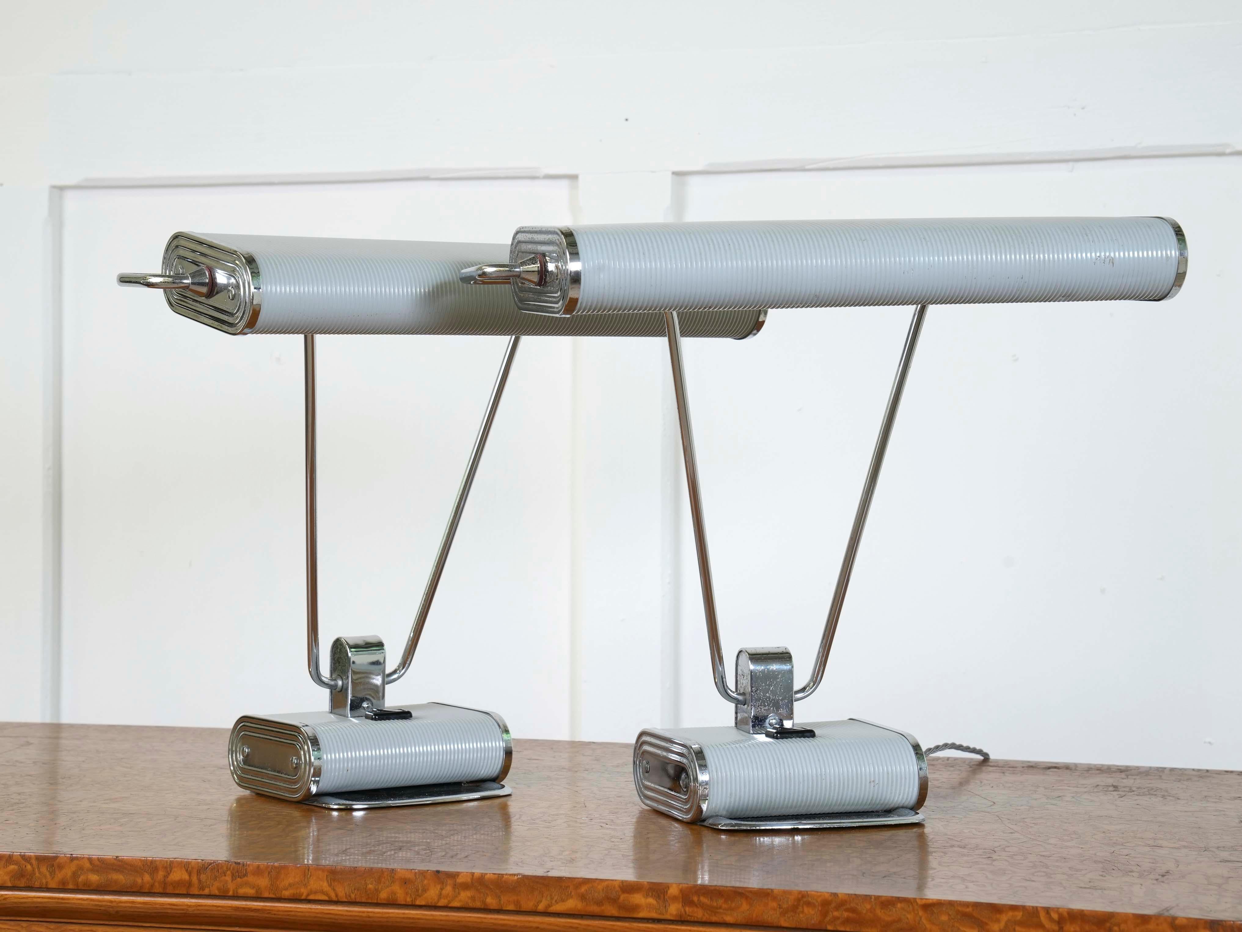 A Pair of Grey No.71 desk lamps designed by Eileen Gray and produced by Jumo of Paris.

France, circa 1935-40.

Price is for the pair.

Eileen Gray was a hugely influential designer, architect and artist of the early twentieth century.

A