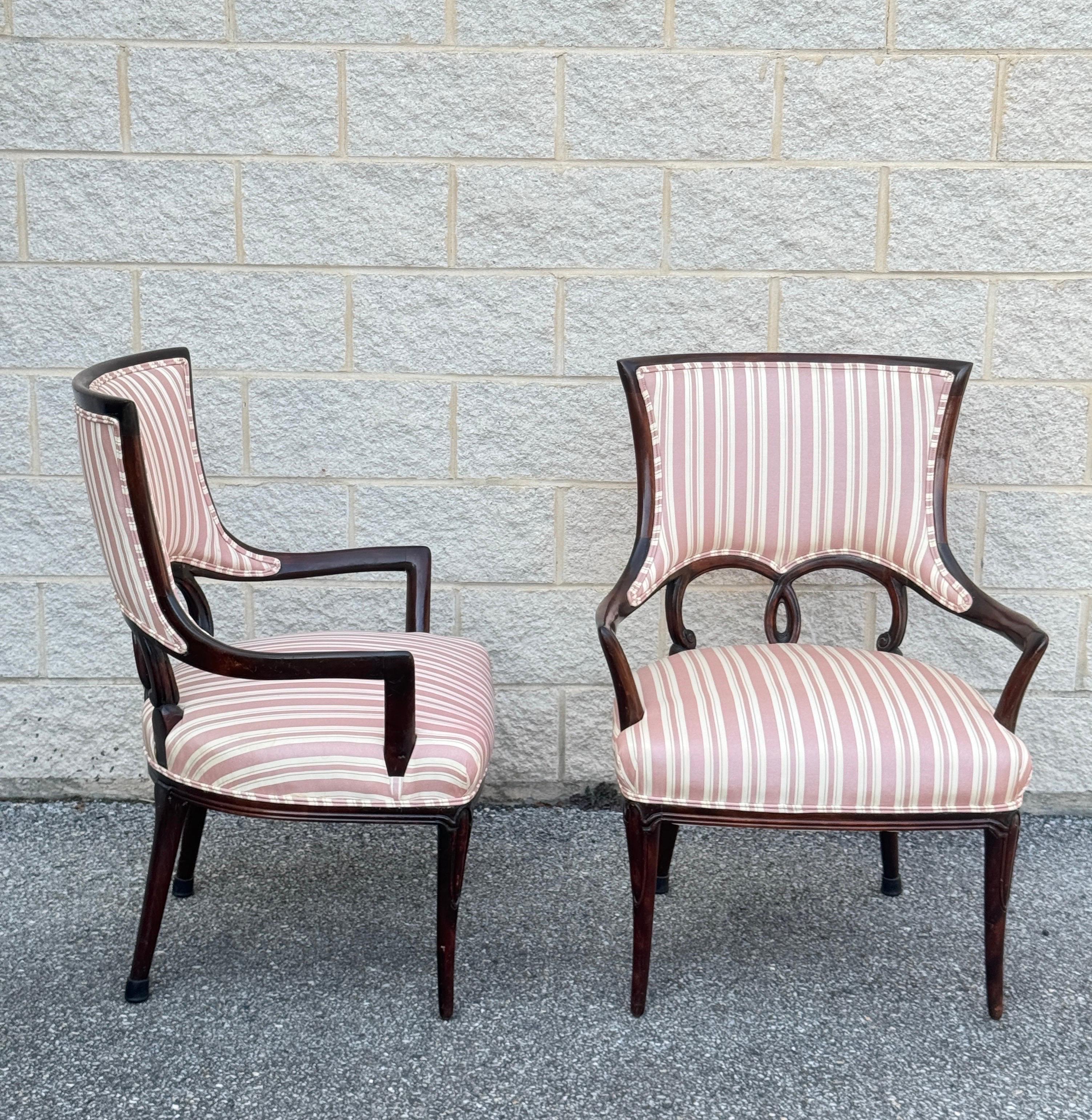 A Pair of 1950s Grosfeld House Style ebonized armchairs with striped upholstery.