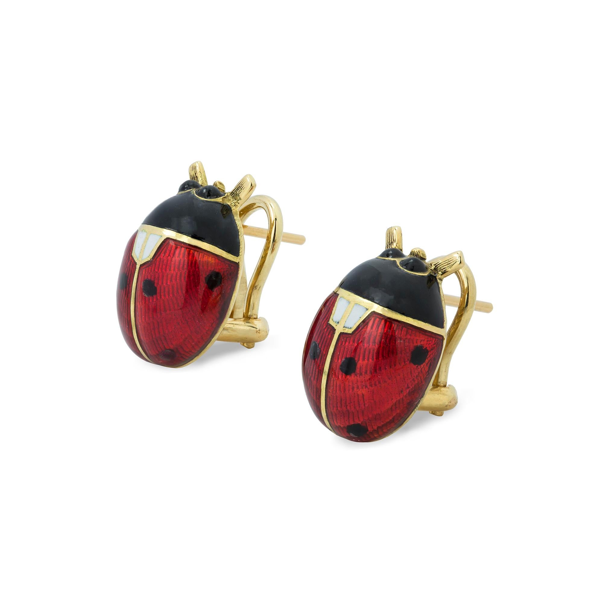 A pair of guilloche enamel ladybird earrings, the red, black and white enamelled body of each ladybird, to a yellow gold mount with post and clip fittings, hallmarked 18ct gold, London, 2018, made by Bentley & Skinner, gross weight 14.3 grams.

This