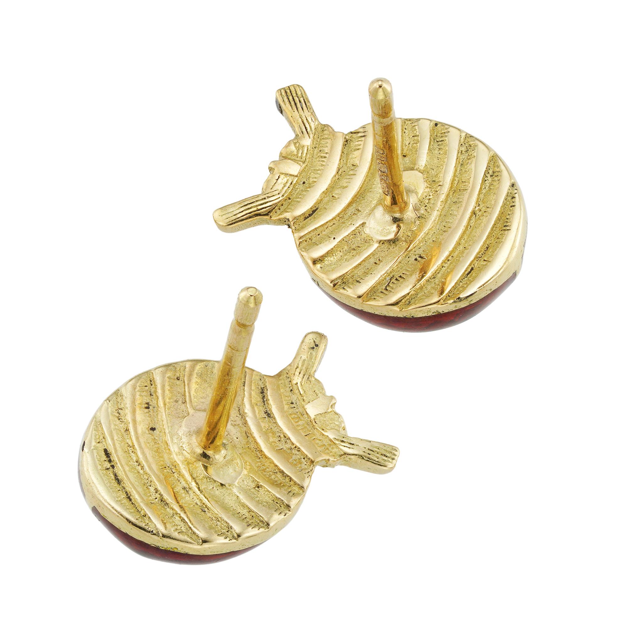 A pair of guilloché enamel ladybird earrings, each with red, black and white enamelled body, all to a yellow gold mount with post and scroll fitting, hallmarked 18ct gold London, 2019, made by Bentley & Skinner, measuring 1.1 x 0.8cm, gross weight