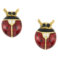 Paire de boucles d'oreilles coccinelle en émail guilloché