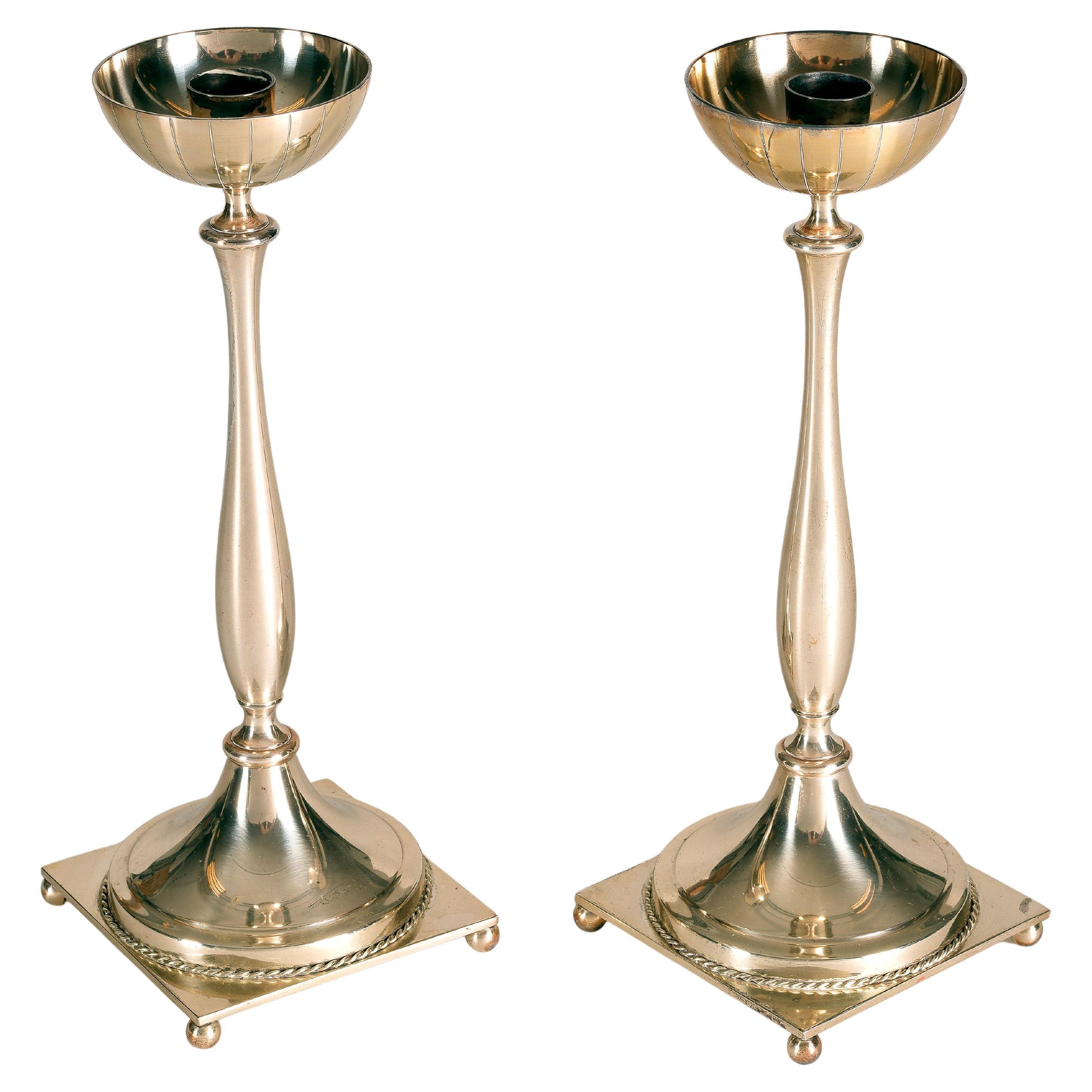 A pair of Gunnar Ander candle sticks, silver plated metal, 1940s