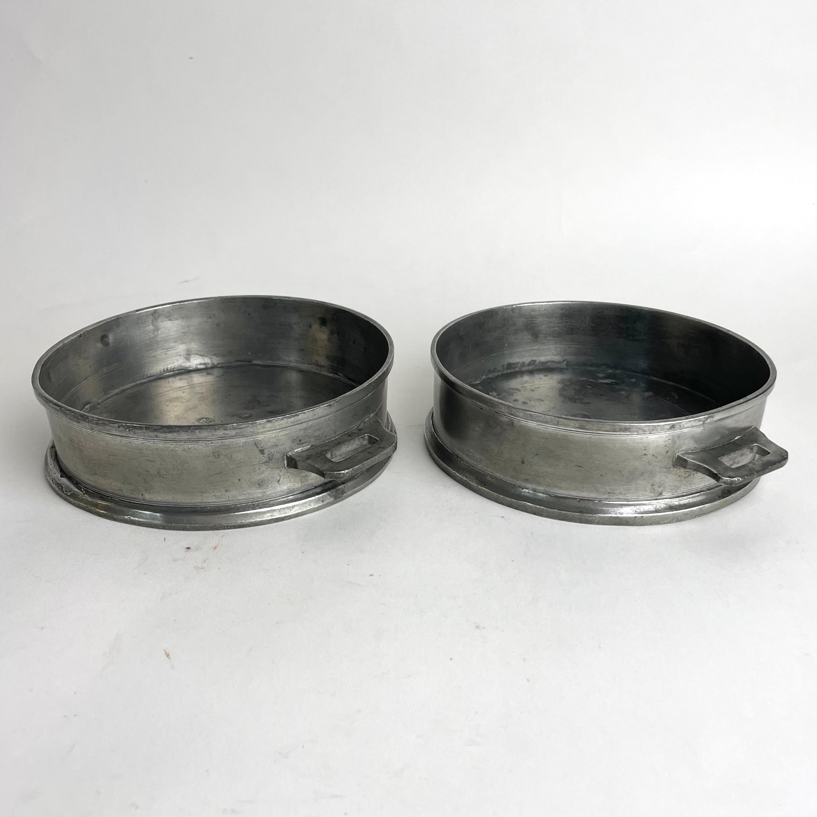 Early 19th Century A pair of Gustavian Pewter magnum bottles Coasters dated 1808