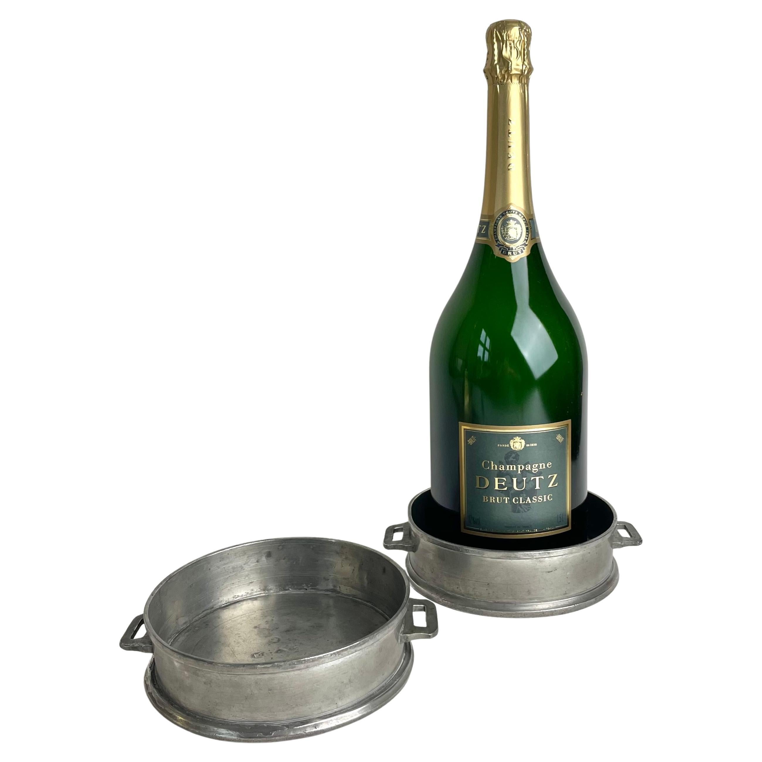 A pair of Gustavian Pewter magnum bottles Coasters dated 1808