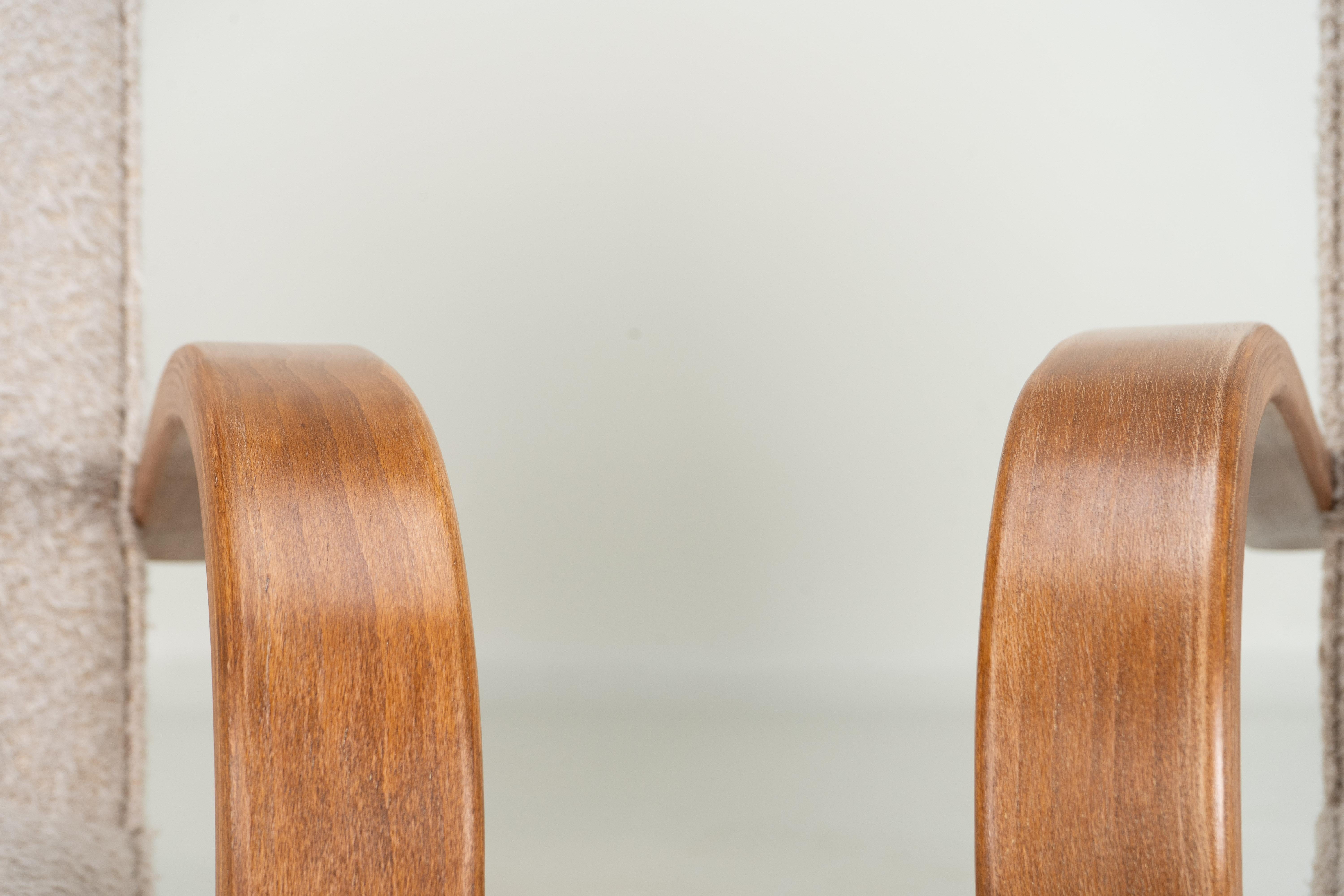 Bouclé A Pair of Halabala Style Chairs with Curved Arms and Legs in vendita