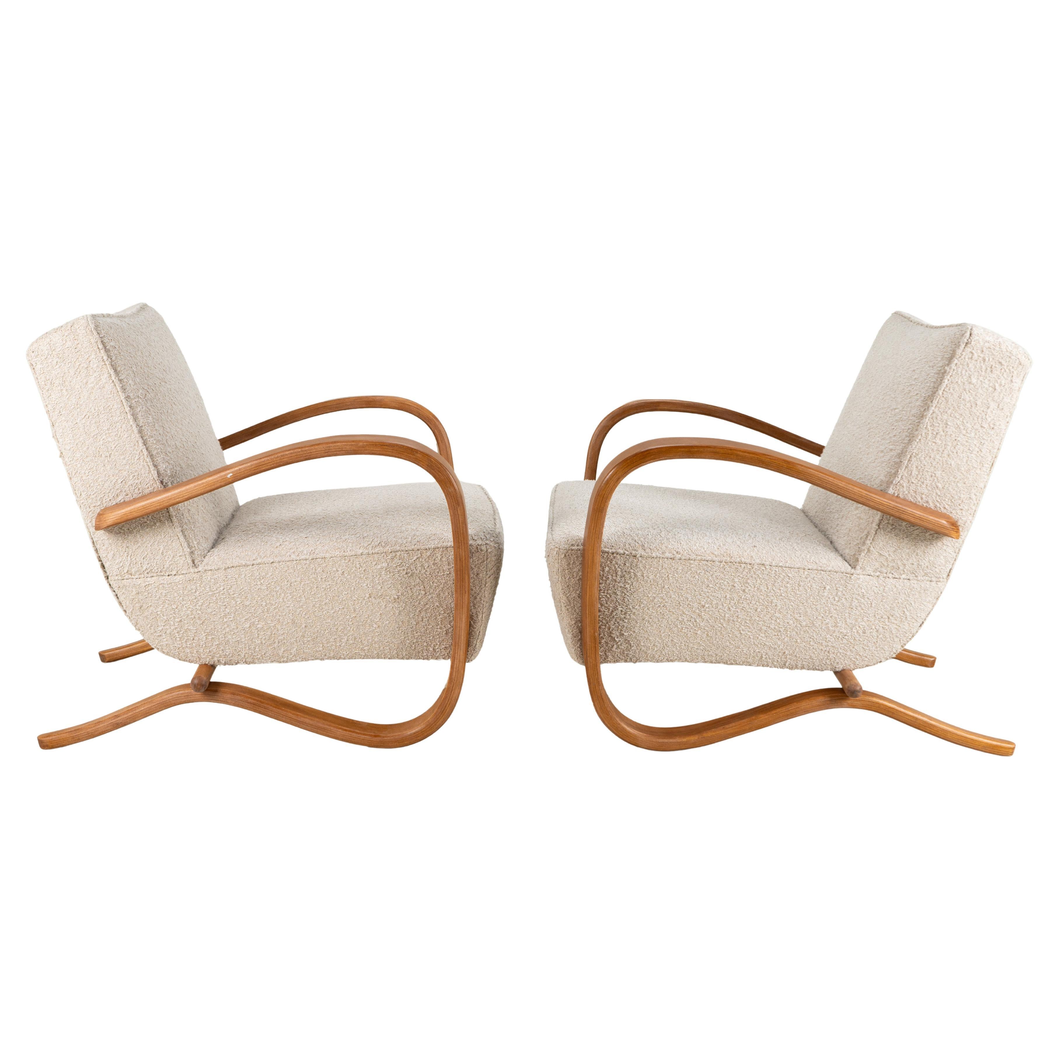 A Pair of Halabala Style Chairs with Curved Arms and Legs in vendita