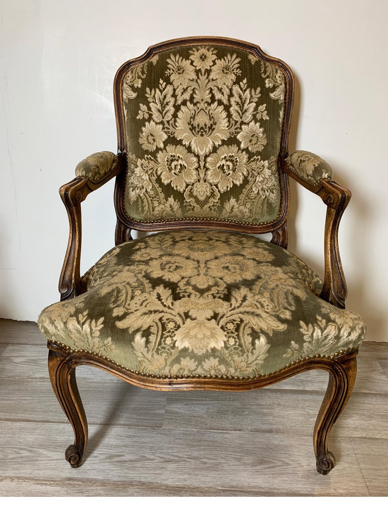 A Pair of hand carved French Fauteils Arm Chairs For Sale at 1stDibs