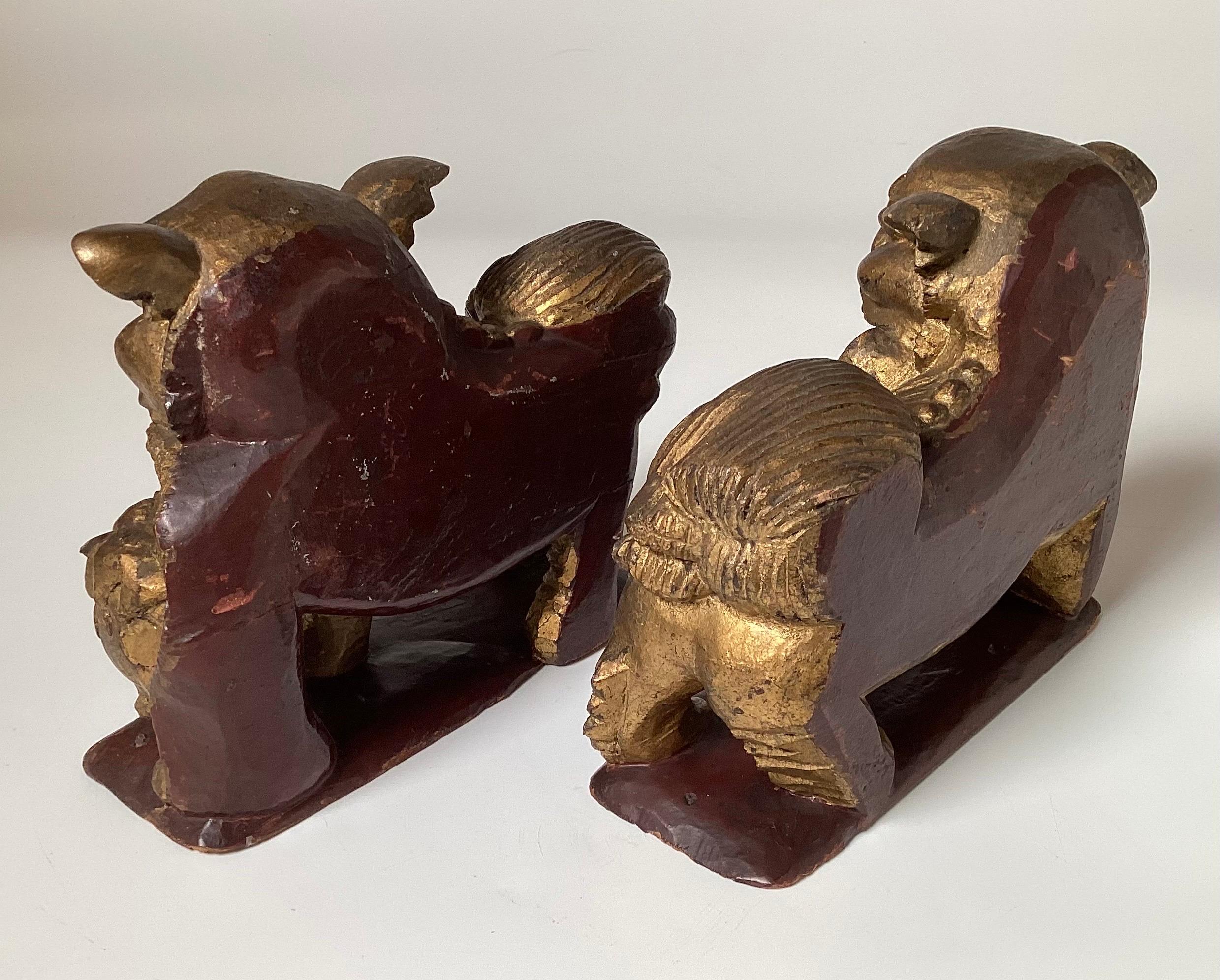 Hand-Carved A Pair of Hand Carved Gilt Wood Chinese Export Foo Dogs  For Sale