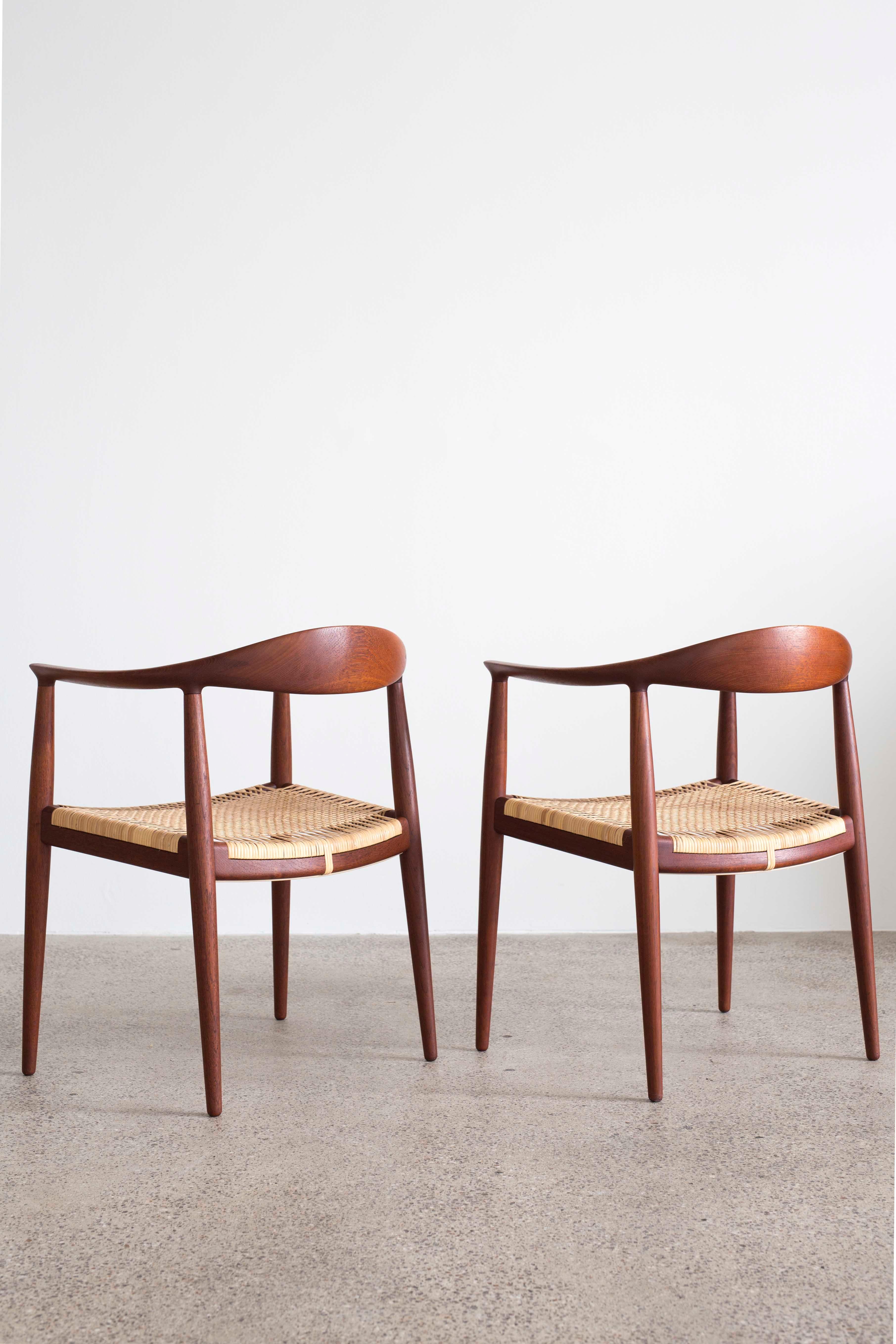 A pair of Hans J. Wegner 'The chair'.
Frame of teak with cane seat.
Designed by Hans J. Wegner 1949 and manufactured and marked by Cabinetmaker Johannes Hansen, Denmark.