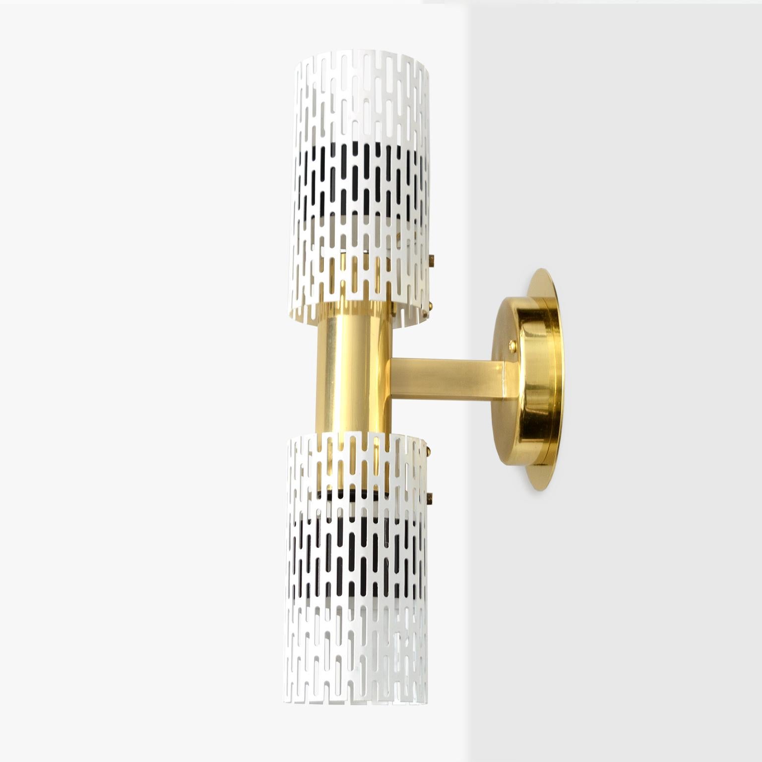 Swedish A pair of Harald Notini designed wall sconces with pieced tubular painted metal For Sale