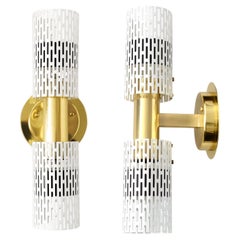 Vintage A pair of Harald Notini designed wall sconces with pieced tubular painted metal