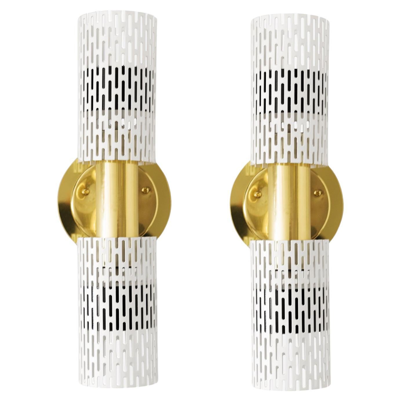 A pair of Harald Notini designed wall sconces with pieced tubular painted metal For Sale