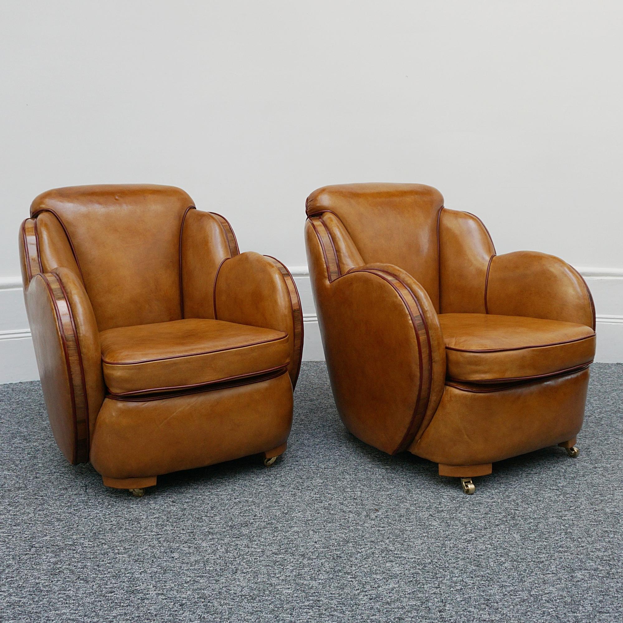 English A Pair of Harry & Lou Epstein Brown Leather and Walnut Art Deco Cloud Armchairs 