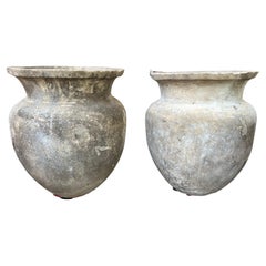 A Pair of Heavy Cast Stone Orcio Pots from Southern Italy