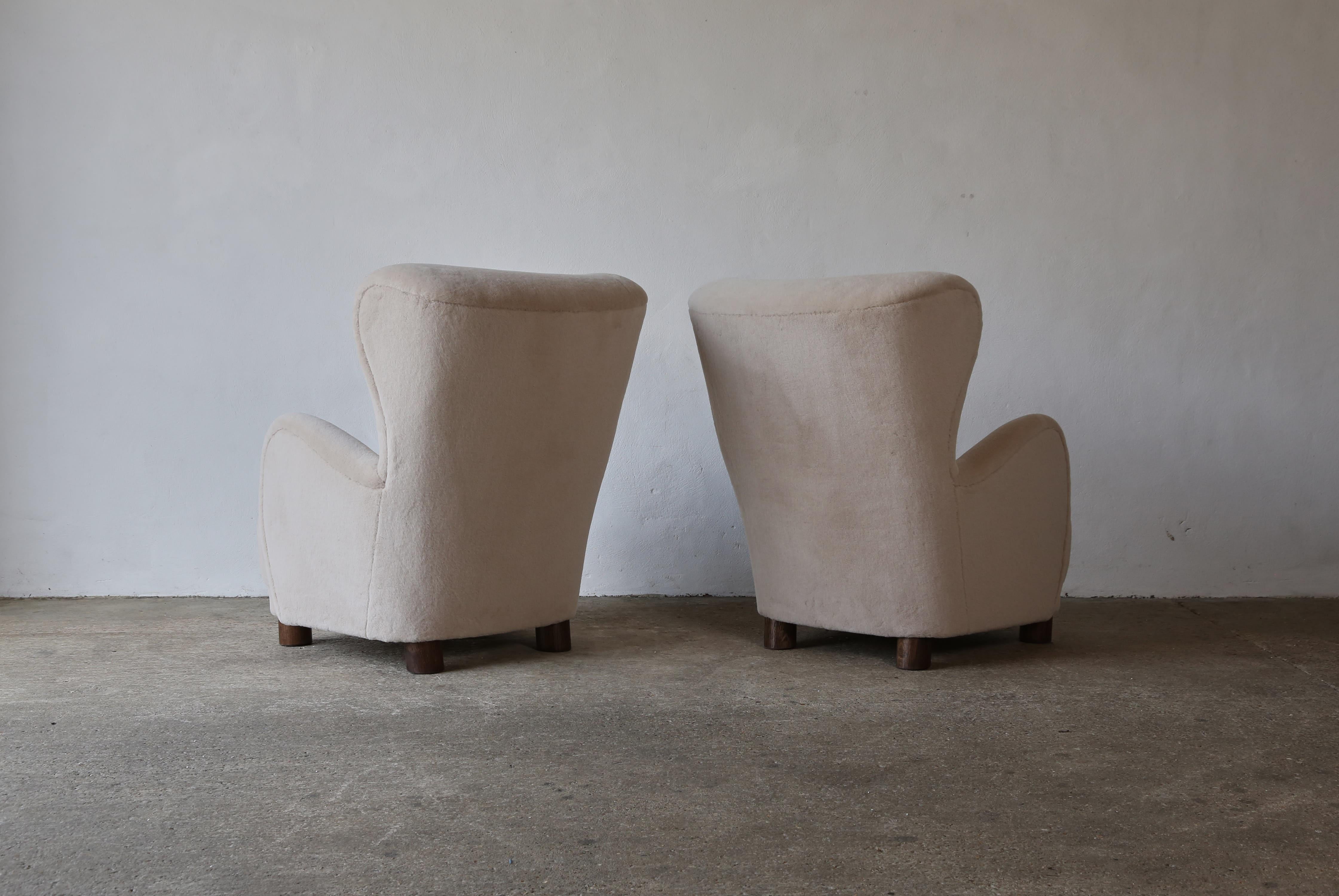 Contemporary A Pair of High Back Arm Chairs, Upholstered in Pure Alpaca
