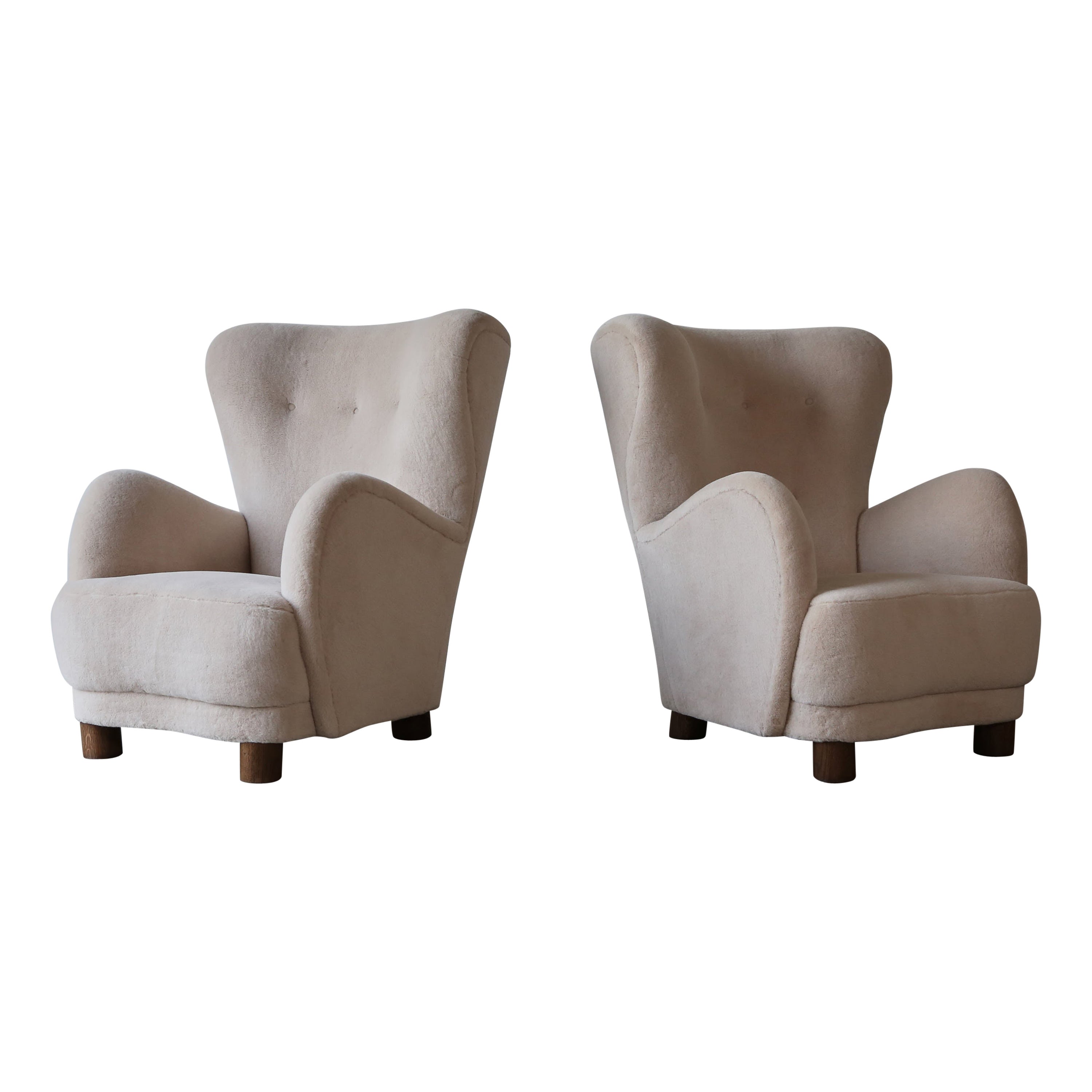 A Pair of High Back Arm Chairs, Upholstered in Pure Alpaca For Sale