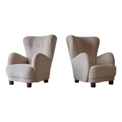 Ein Paar Sessel mit hoher Rückenlehne, gepolstert mit reinem Alpaka