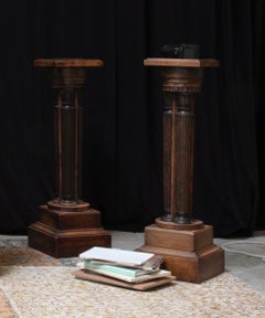 A pair of highly-carved antique French pedestals, 19th century