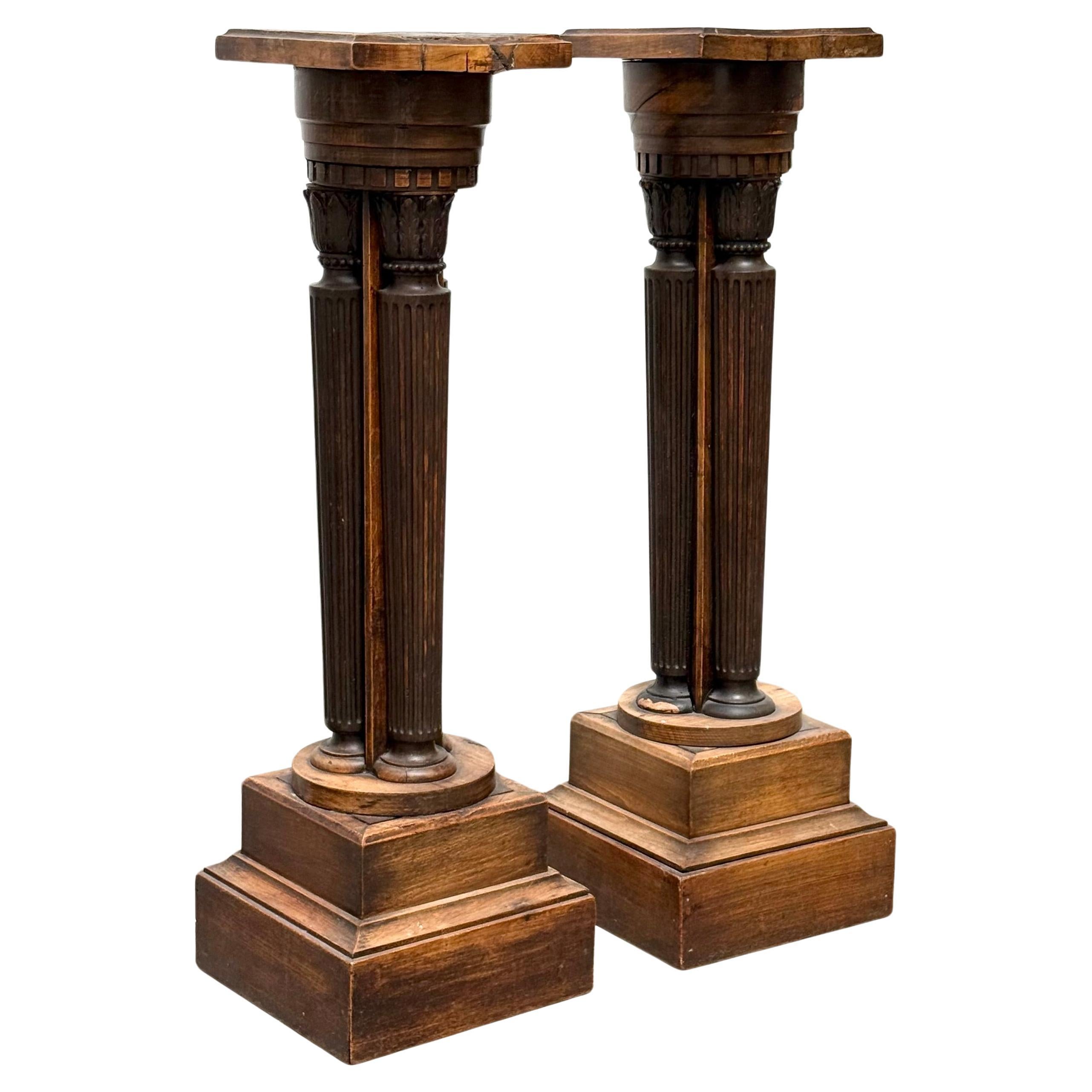 A pair of highly-carved antique French pedestals, 19th century For Sale