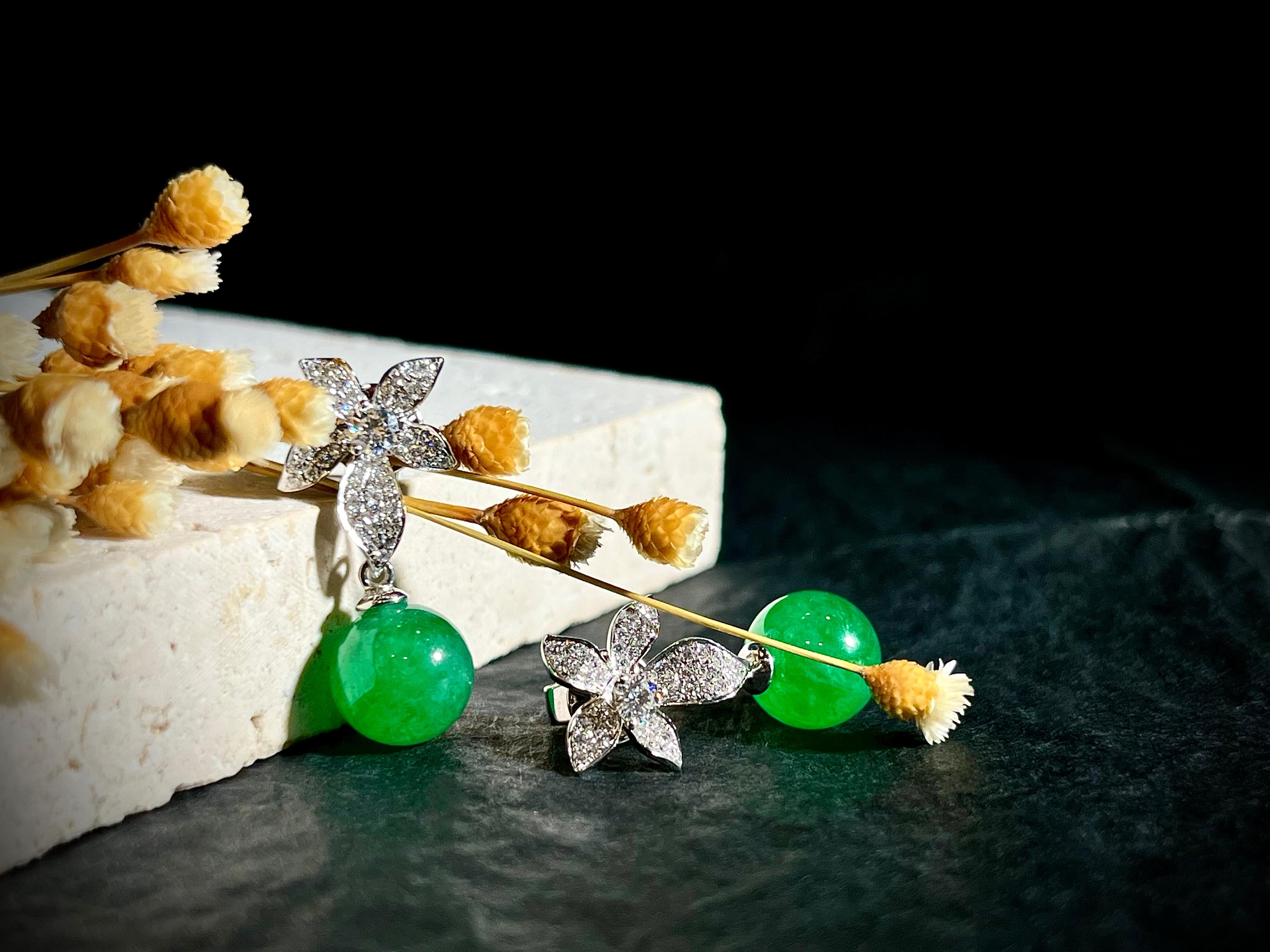 Contemporary A Pair of Highly Translucent Jadeite Beads and Diamond Earrings in 18 Karat Gold For Sale