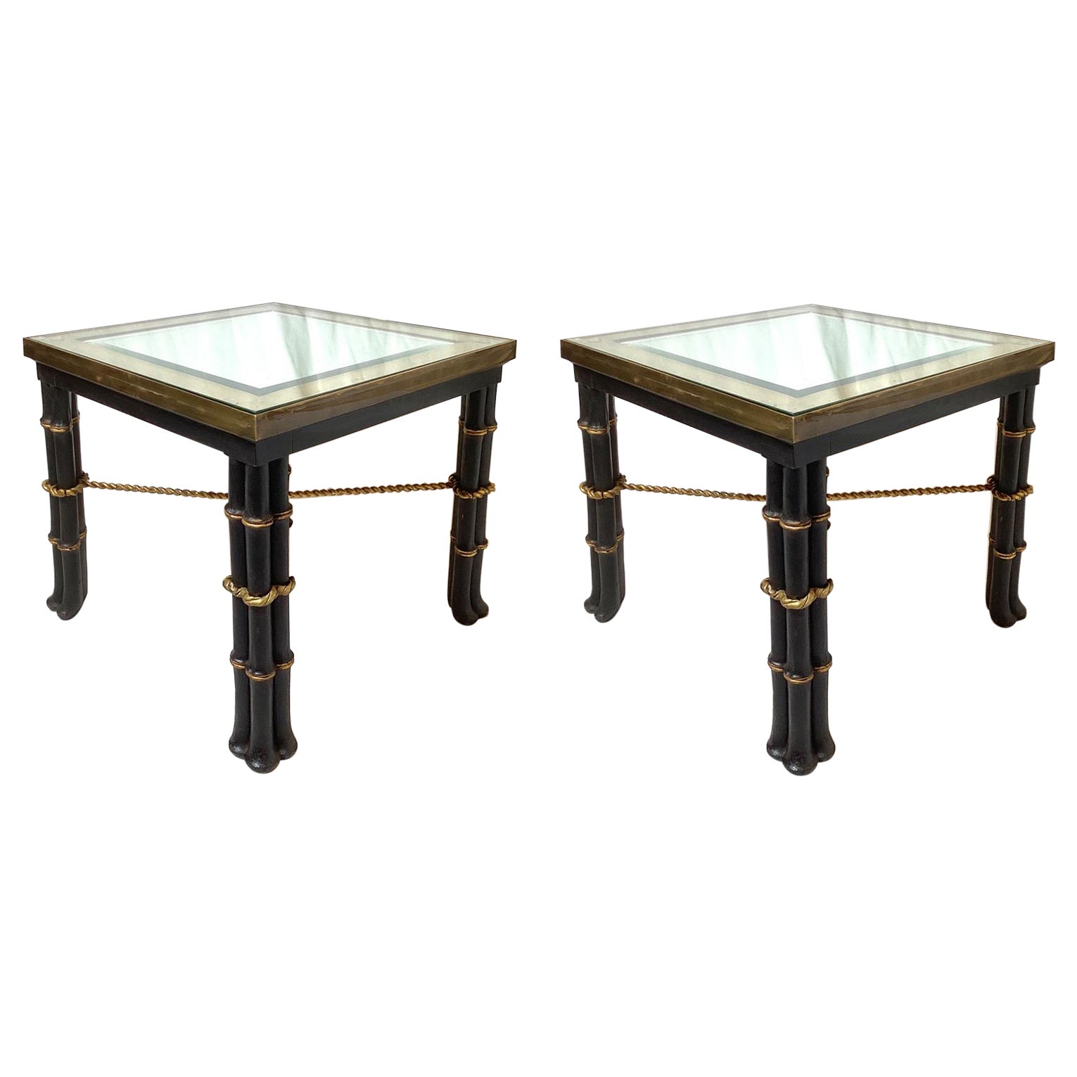 A Pair of Hollywood Regency Ebonized and Brass Side Tables