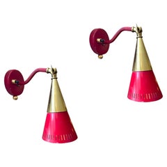A pair of Holm Sorensen 1960s red lacquer and brass adjustable wall lights