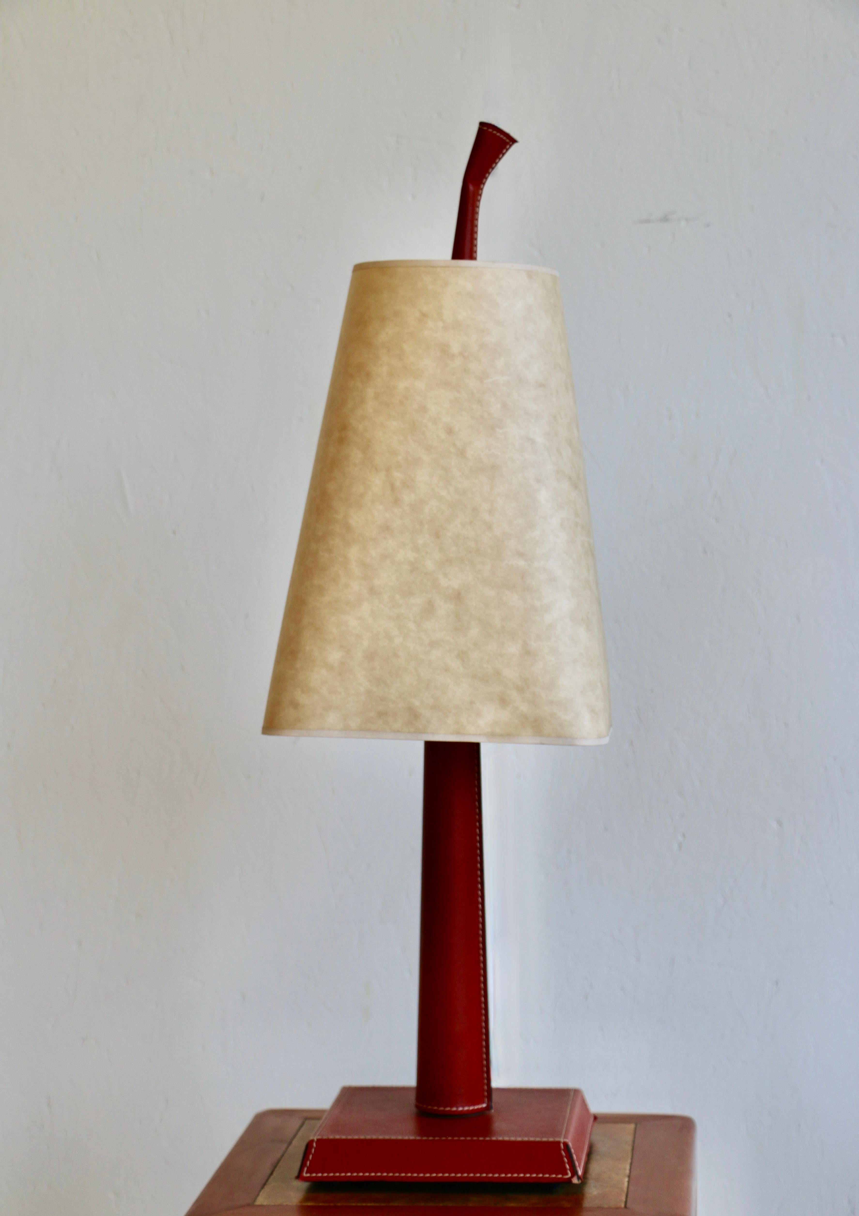 Leather A pair of Hugues Chevalier lamps. Model Ray XM. France 90's For Sale