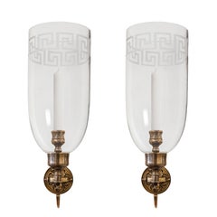 A pair of Hurricane Sconces with Etched Greek Key Shades by David Duncan Studio