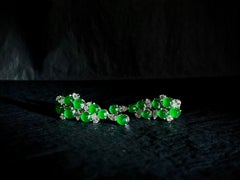A Pair of Imperial Jadeite and Diamond Earrings in 18 Karat White Gold