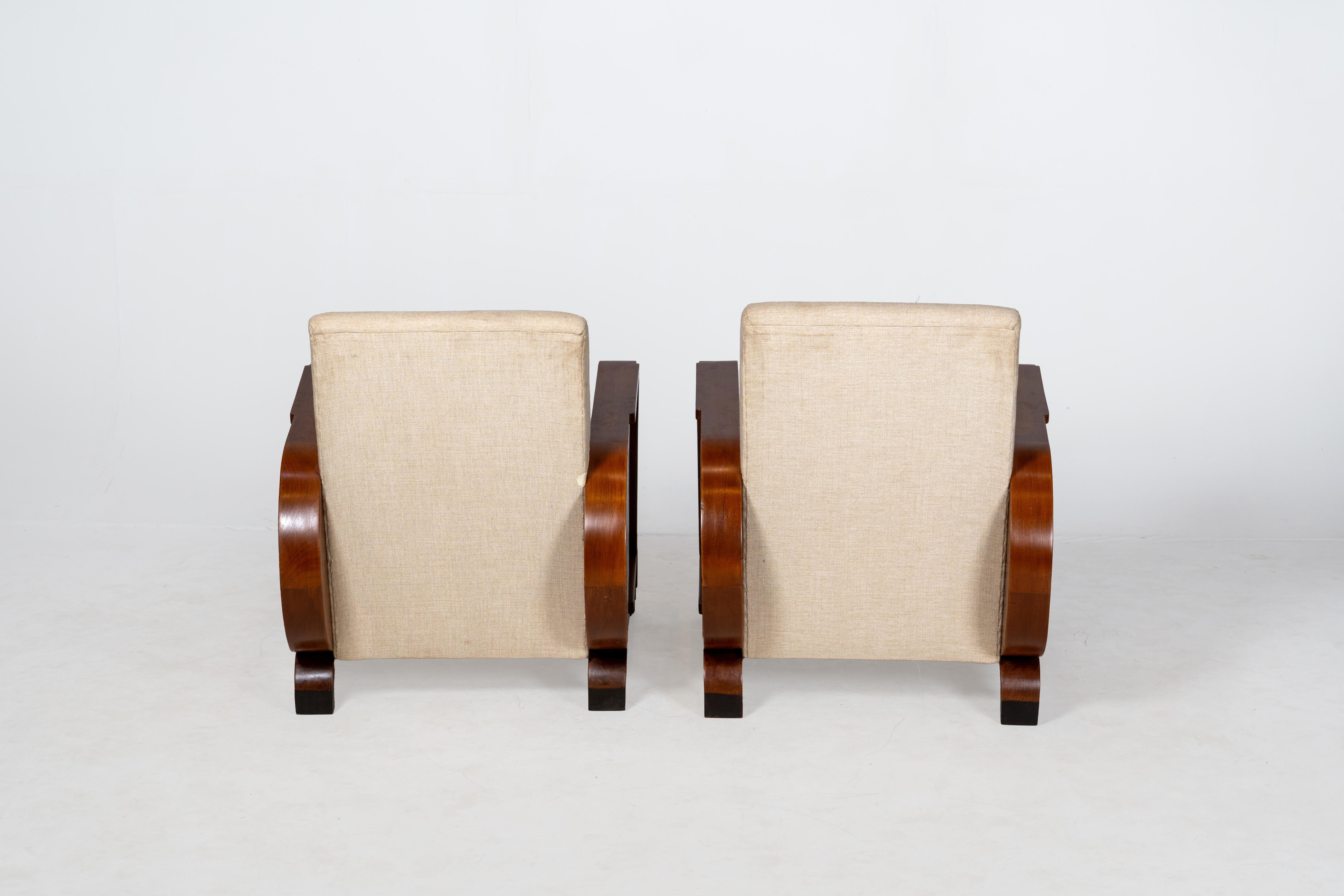 Teck Paire de fauteuils club indiens Art déco en vente