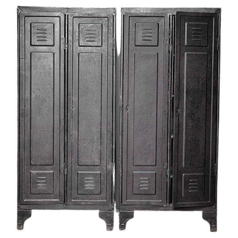 A matching pair of particularly old and unusual vintage, steel, two door lockers, featuring panelled doors, vents and original shelving. The steel is full of character and has a wonderful patina. Restored, stripped, finished and sealed. Can be sold