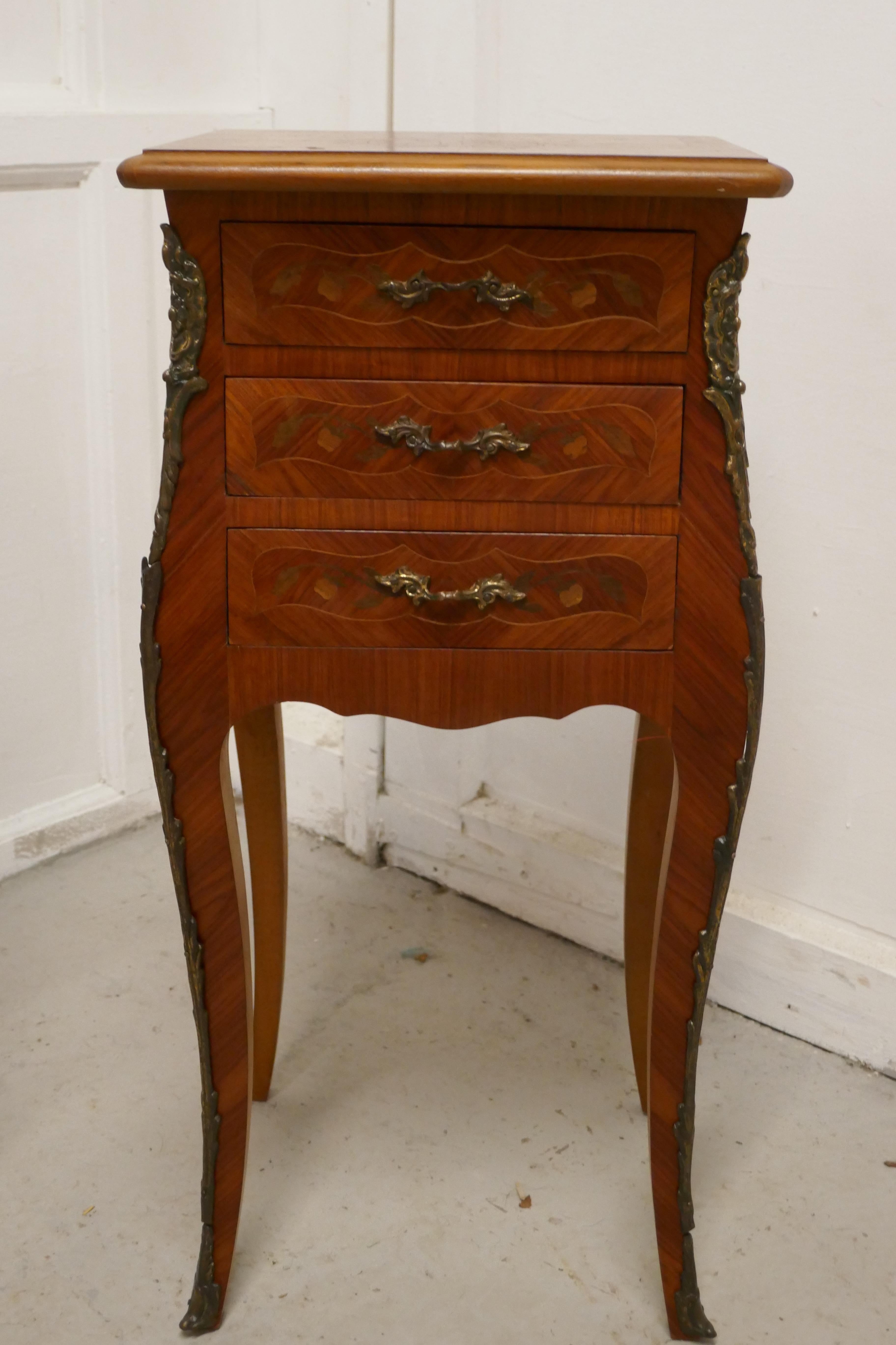 A pair of inlaid French Marquetry bombe shaped bedside cupboards

These are a pair of French Louis XVI style Marquetry bedside tables, the cabinets are beautifully inlaid in a wonderful variety of woods
The chests have a serpentine shaped front