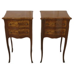A Pair of Inlaid French Serpentine Shaped Bedside Cabinets