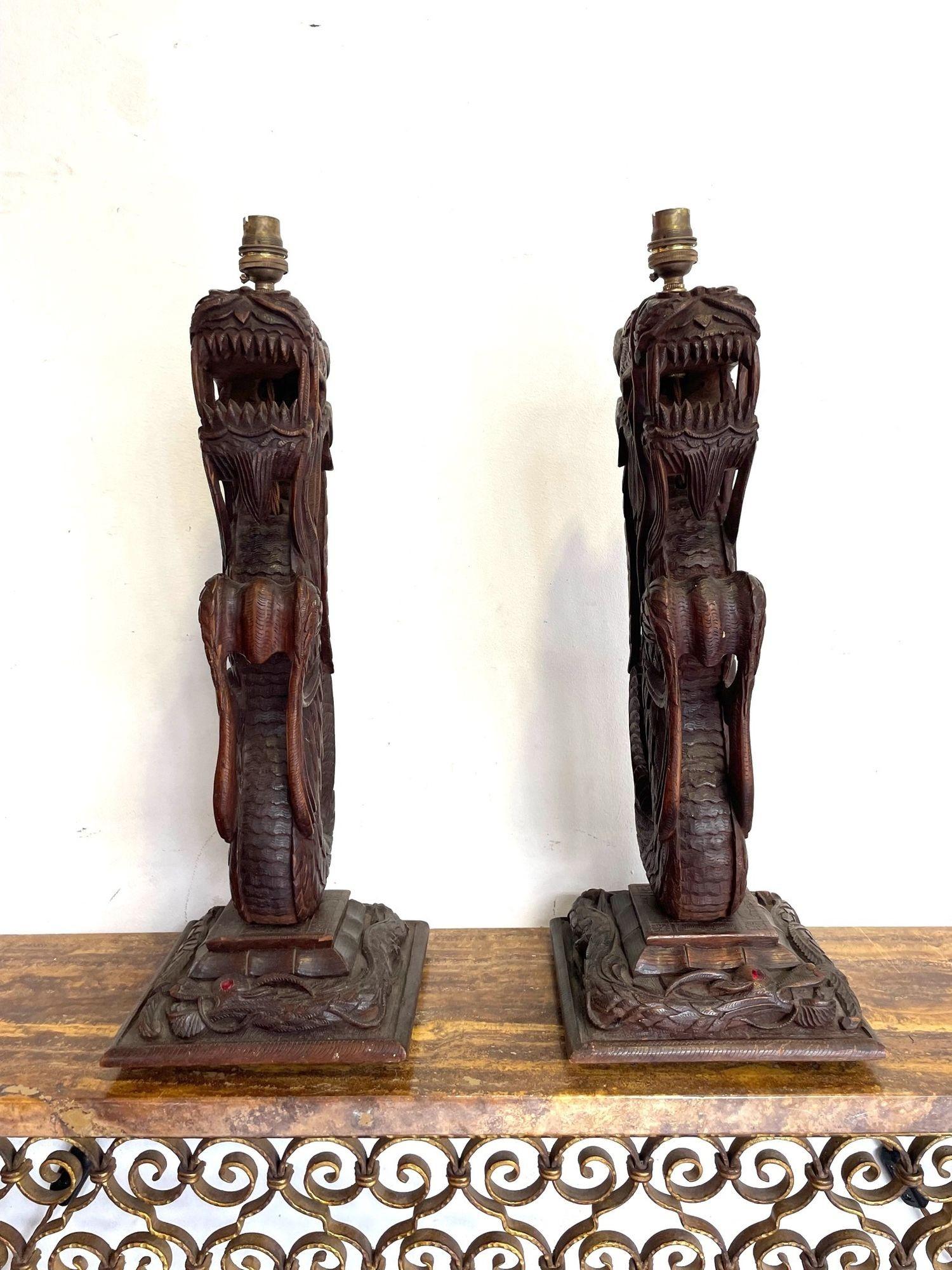 Pair of Intricately Carved Burmese Dragon Lamps Each Mounted on Carved Wooden For Sale 3