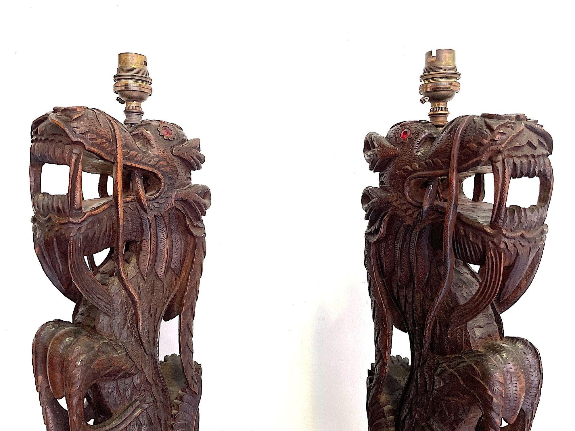 Pair of Intricately Carved Burmese Dragon Lamps Each Mounted on Carved Wooden For Sale 8