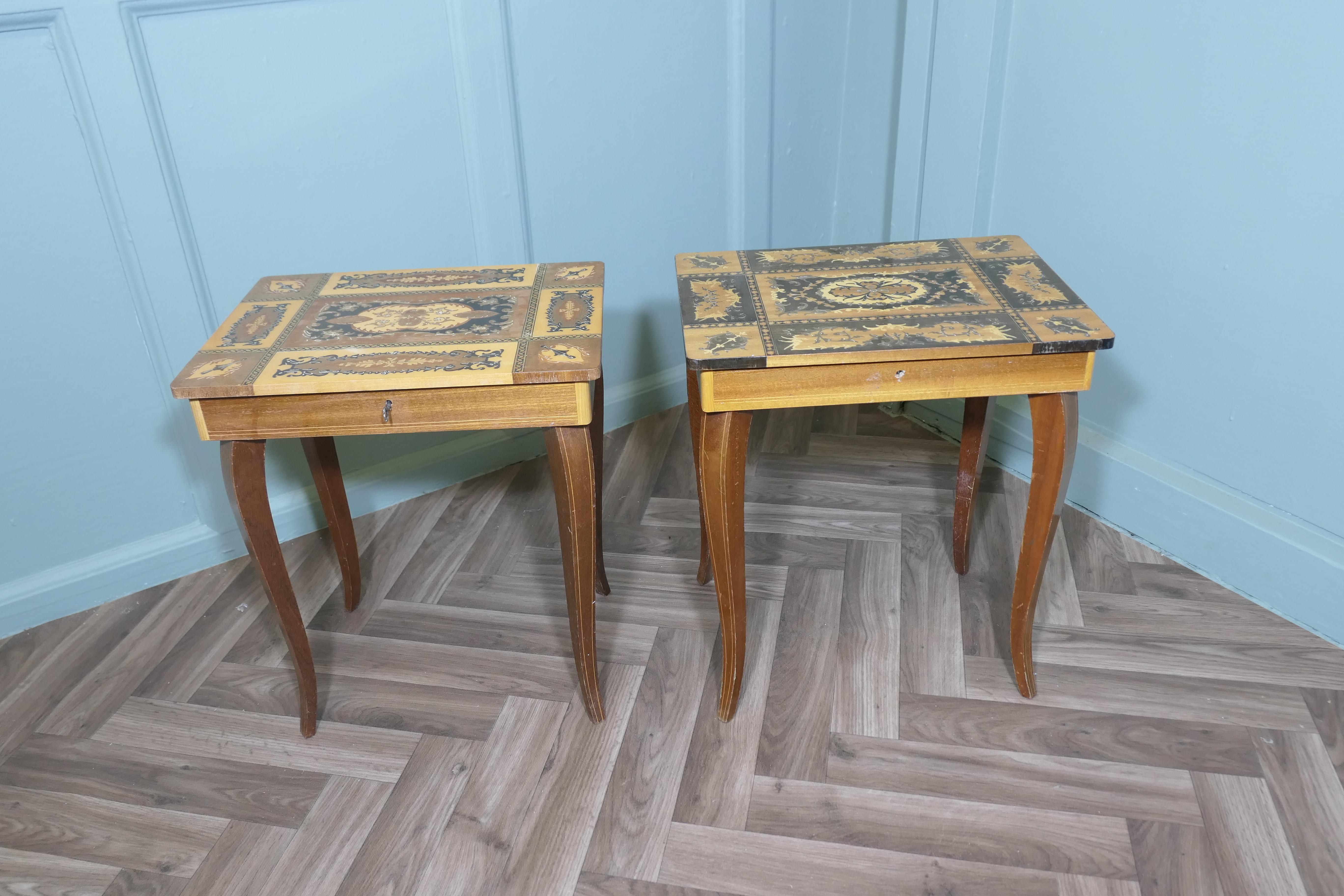 A Pair of Intricately Decorated Italian Musical Side Tables

An unbelievable pair, yes 2 musical tables, the marquetry table tops enclose a compartmented jewellery tray and when the top is opened it starts the musical movement and you can be