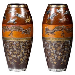 Paire de vases en fer et bronze de Hamada Sei