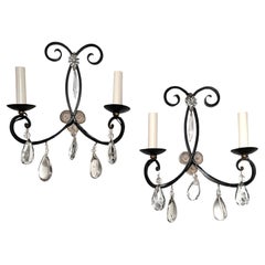 A Pair of Iron and Crystal Sconces