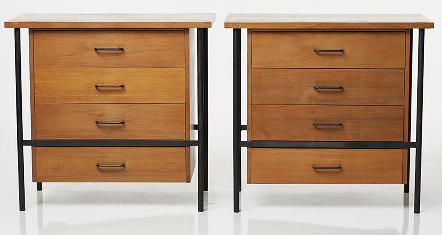 A great example of California Mid-Century Modern design. Designed by Donald Knorr for Vista. Steel armitures painted black supPorting walnut chests.