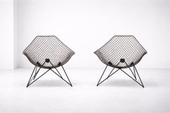 A pair of iron armchairs by Gastone Rinaldi, model "Du 43" Manufactured by Rima