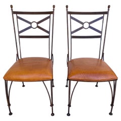 A Pair of Iron & Leather Chairs