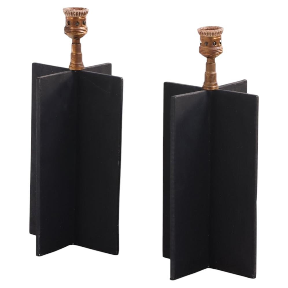 A Pair of Iron Table Lamps in the manner of Jean-Michel Frank.
