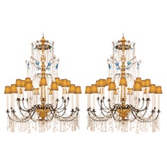 A pair of Italian 18th century Genovese st Giltwood Glass Crystal chandeliers