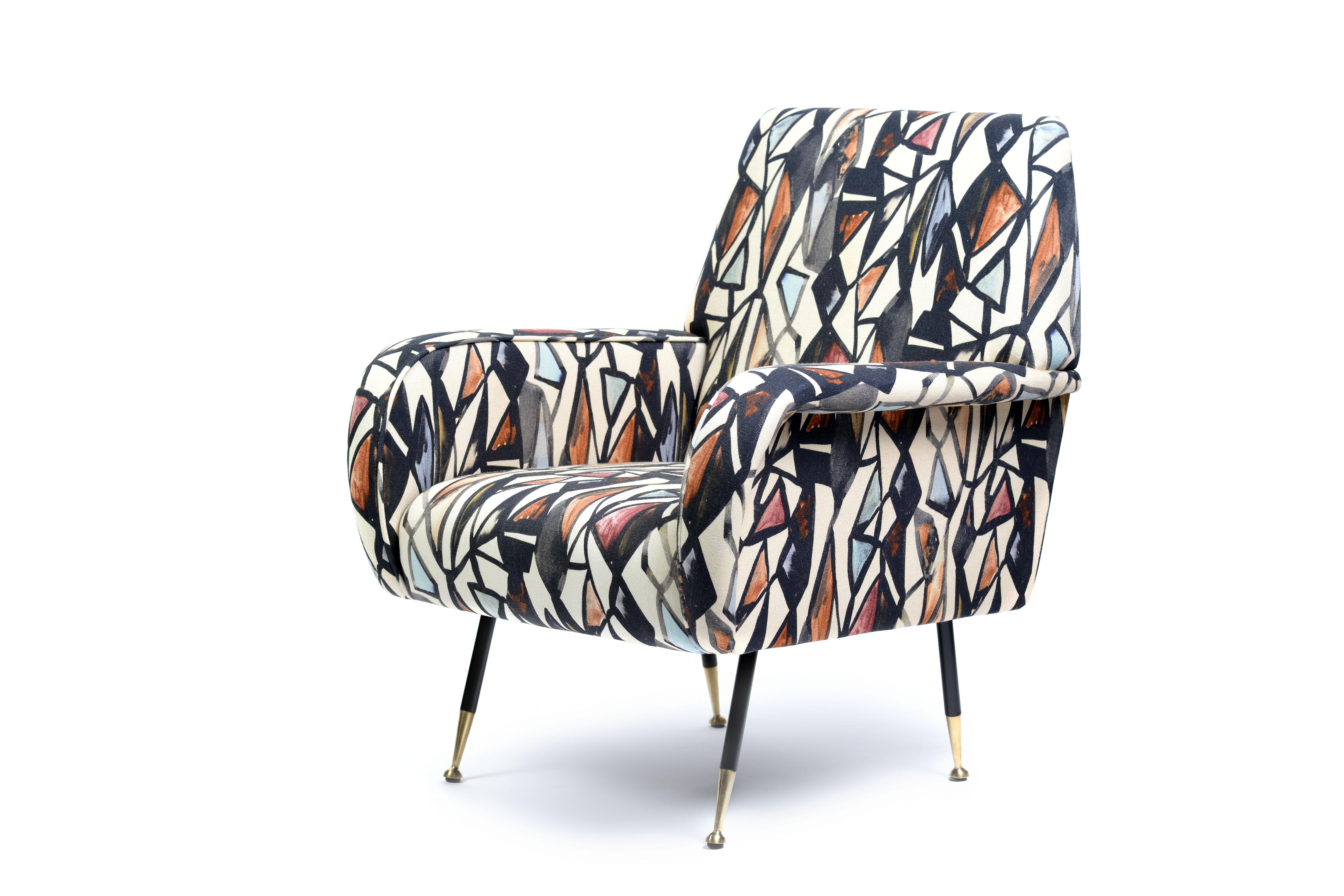 A pair of original Italian armchairs from the 1960s, reupholstered in a Picasso inspired 100% linen fabric, by Alessandro Bini.